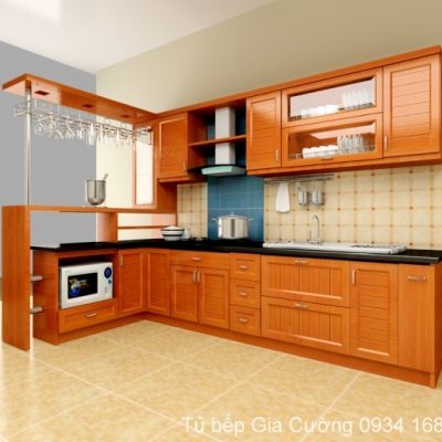 Tủ bếp gỗ xoan đào tự nhiên sơn màu pu vàng